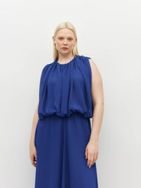 Juliette Hogan Alden Dress (Georgette Yoryu) Cobalt is an elegant event dress. A sleeveless, maxi style with soft draping.