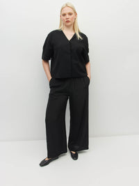 Juliette Hogan Koa Trouser (Silk CDC) Black - simple straight wide leg silk pants with elasticated waist and pockets.