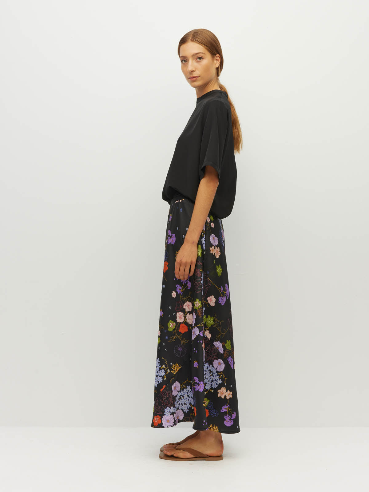 Juliette Hogan Em Skirt (Afterglow Floral Twill) Noir - bias-cut printed skirt with elastic waistband and lower-calf hem.