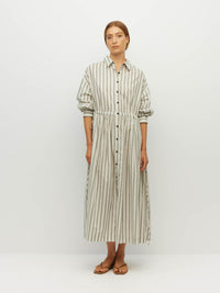 Juliette Hogan Lenora Dress (Batch Stripe Cotton) Pine Line - striped cotton shirtdress with shirt collar, full-length button sleeves, and drop waist with tie detail.