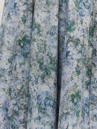 Juliette Hogan Kev Skirt (Cloud Flower Cotton) Frosted Sky - printed ankle-length cotton maxi skirt with elasticated drawcord waist, side pockets, and side splits.