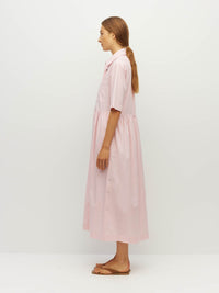 Juliette Hogan Milicent Shirtdress (Pastel Cotton) Pale Pink - relaxed cotton shirtdress with collar, contrast buttons, and gathered skirt, machine washable.