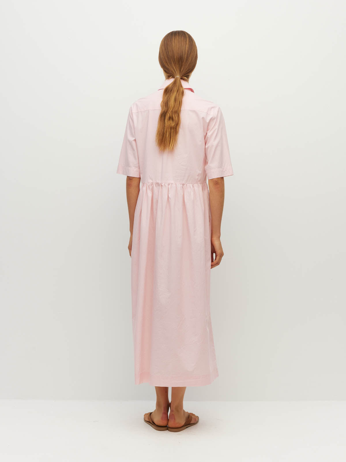 Juliette Hogan Milicent Shirtdress (Pastel Cotton) Pale Pink - relaxed cotton shirtdress with collar, contrast buttons, and gathered skirt, machine washable.