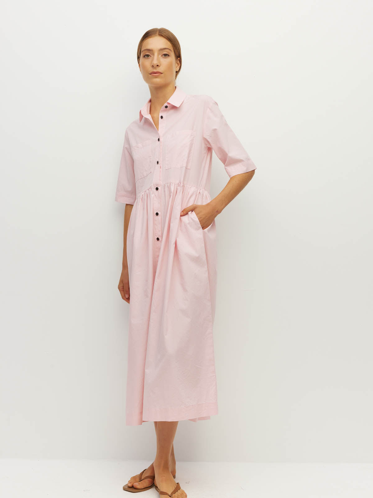 Juliette Hogan Milicent Shirtdress (Pastel Cotton) Pale Pink - relaxed cotton shirtdress with collar, contrast buttons, and gathered skirt, machine washable.