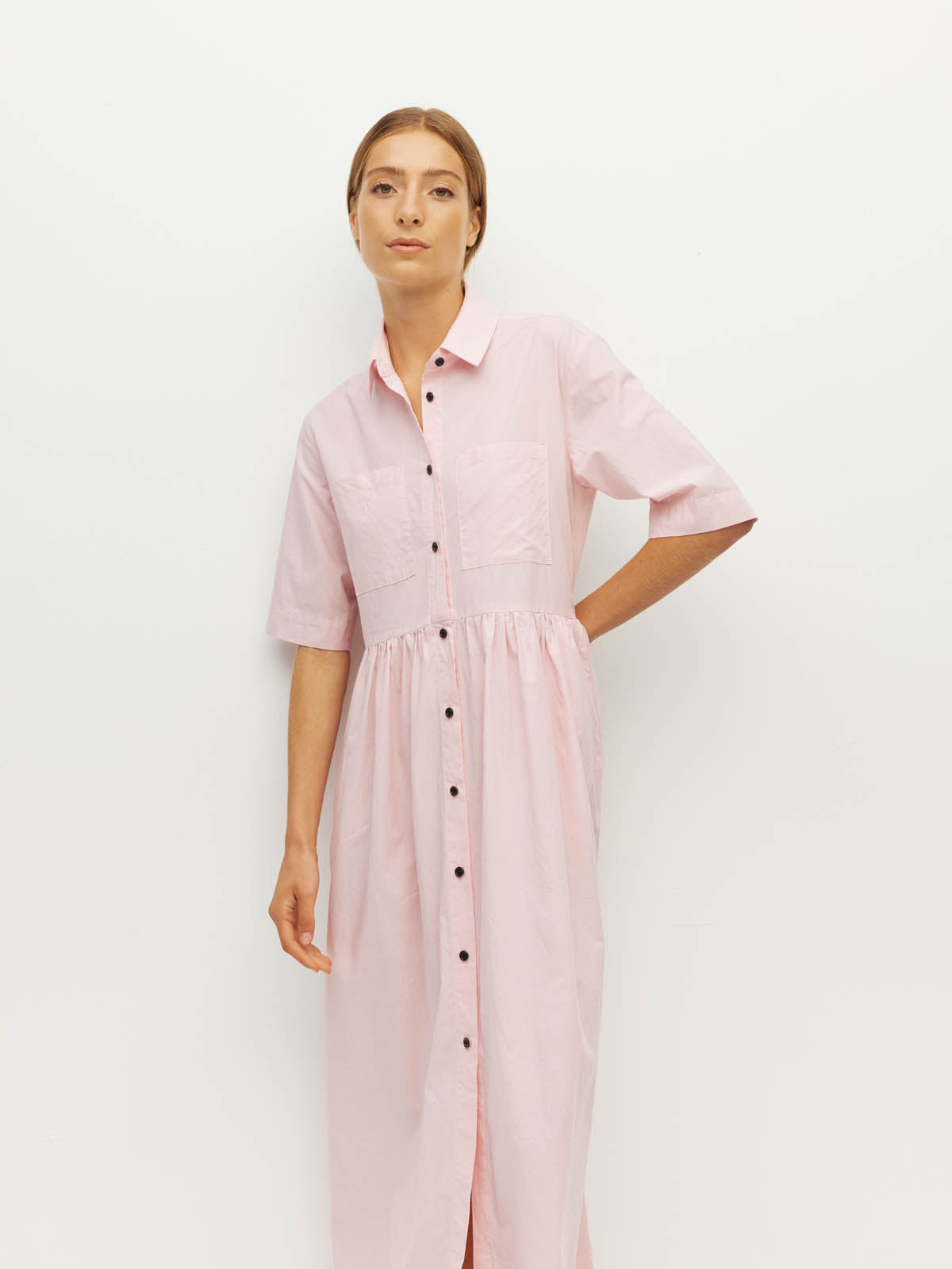 Juliette Hogan Milicent Shirtdress (Pastel Cotton) Pale Pink - relaxed cotton shirtdress with collar, contrast buttons, and gathered skirt, machine washable.