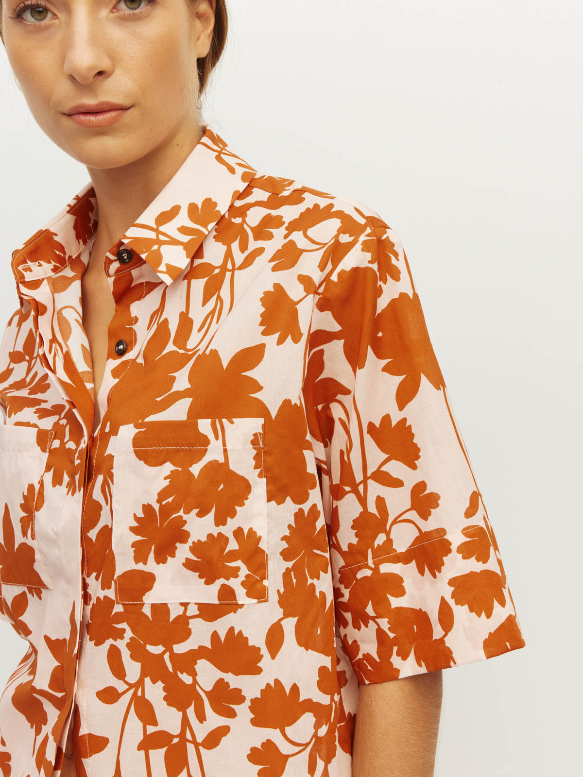 Juliette Hogan Ailsa Shirt (Shadow Floral Cotton) Clay - relaxed-fit summer cotton shirt with concealed button placket, two breast pockets, and gradual scoop hem.