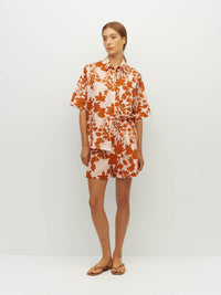 Juliette Hogan Robin Short (Shadow Floral Cotton) Clay - elasticated printed cotton shorts with drawcord waist and side seam pockets, mid-thigh length.