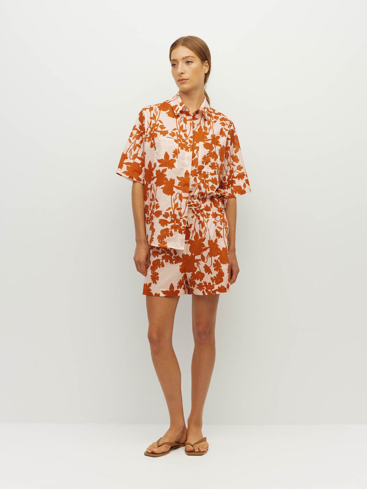 Juliette Hogan Robin Short (Shadow Floral Cotton) Clay - elasticated printed cotton shorts with drawcord waist and side seam pockets, mid-thigh length.