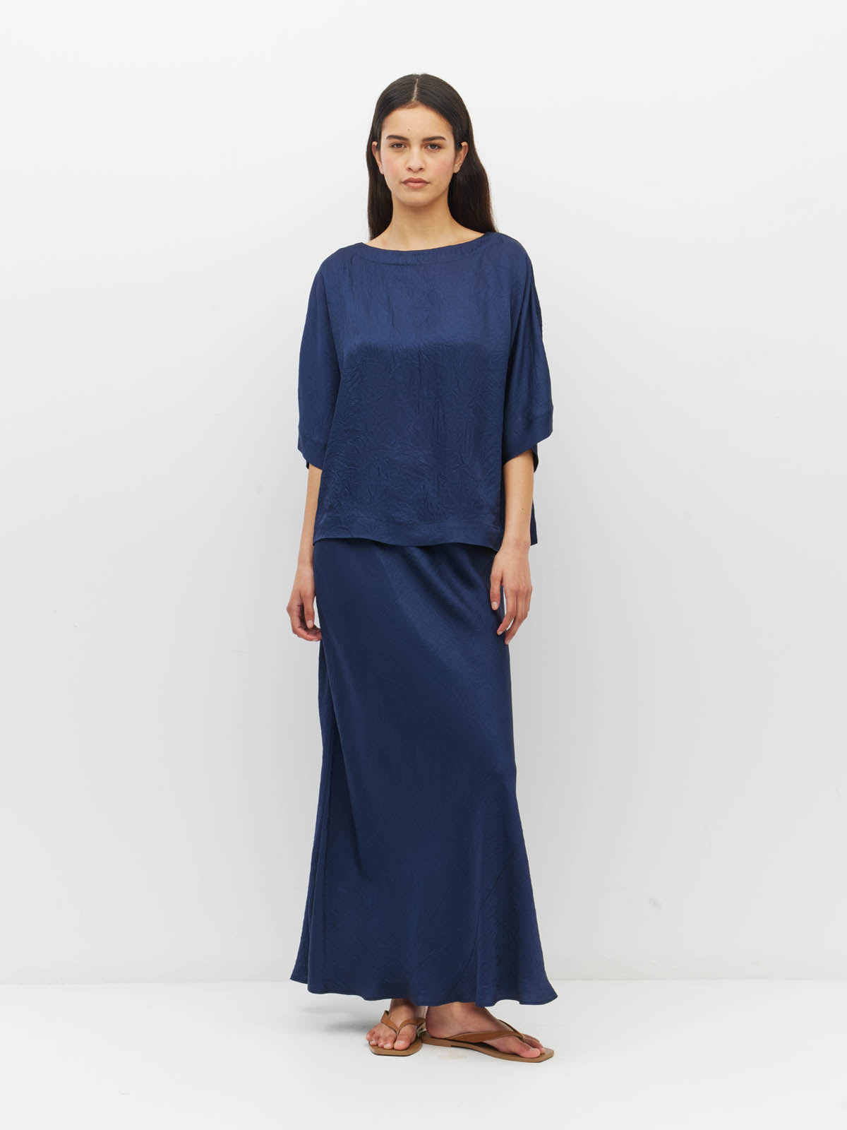 Juliette Hogan Em Skirt (Soft Matte Satin) Navy Crush - bias-cut satin skirt with elastic waistband, lined, lower-calf hem.