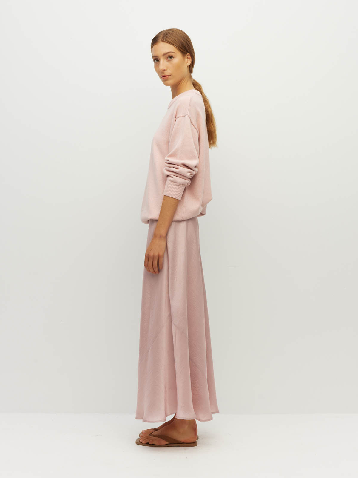 Juliette Hogan Em Skirt (Soft Matte Satin) Pale Pink Crush - bias-cut satin skirt with elastic waistband, lined, lower-calf hem.