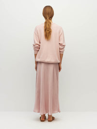 Juliette Hogan Em Skirt (Soft Matte Satin) Pale Pink Crush - bias-cut satin skirt with elastic waistband, lined, lower-calf hem.