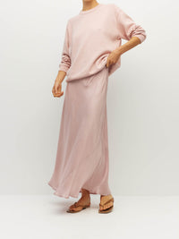 Juliette Hogan Em Skirt (Soft Matte Satin) Pale Pink Crush - bias-cut satin skirt with elastic waistband, lined, lower-calf hem.